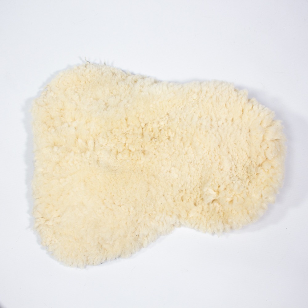 Felix Bühler Sattelsitzbezug Lammfell